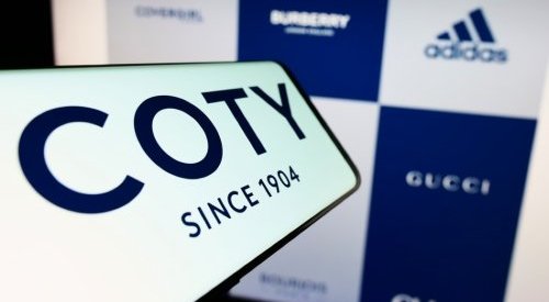 Coty's annual sales surge but profits crumble